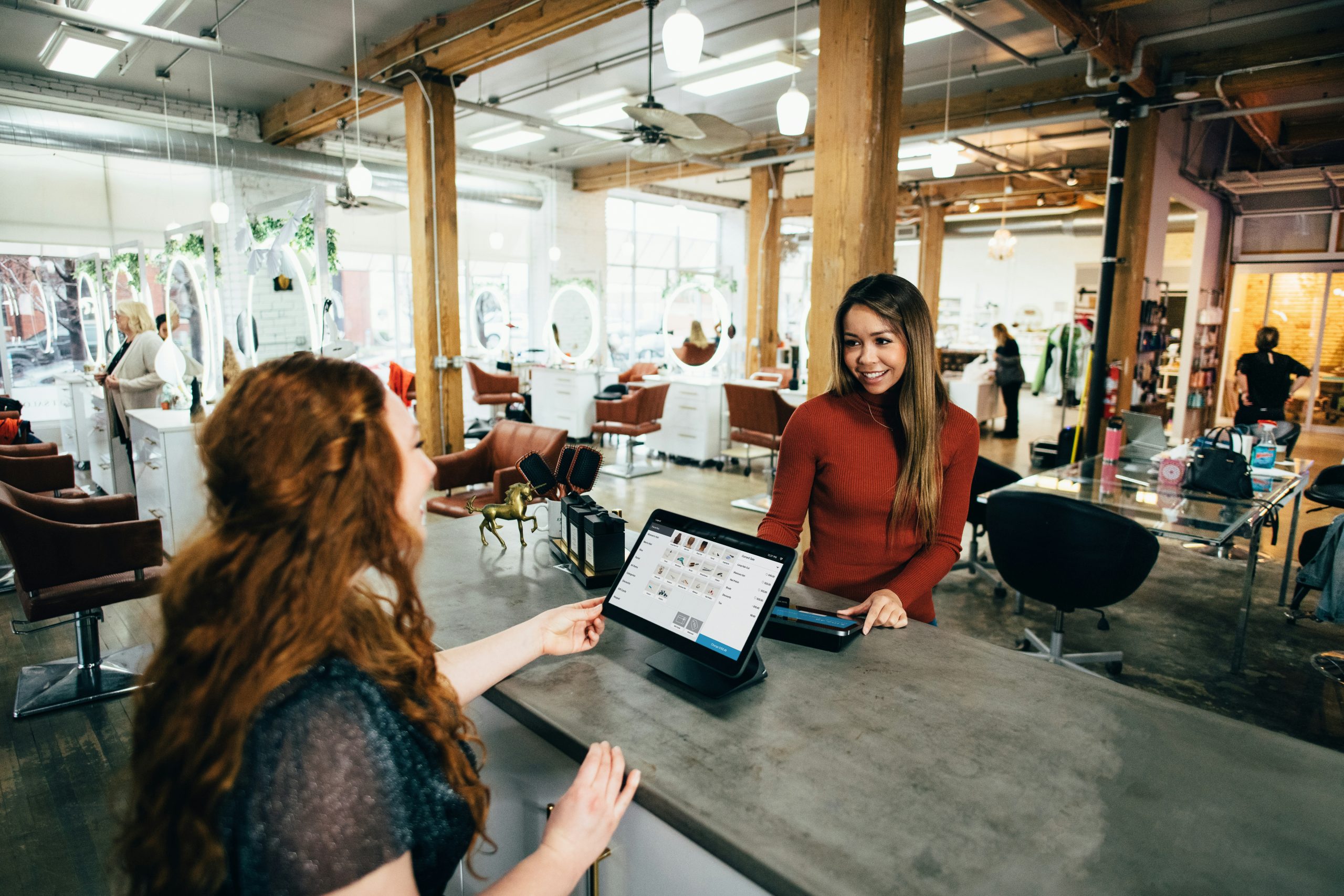 Picture of retail desk and customer